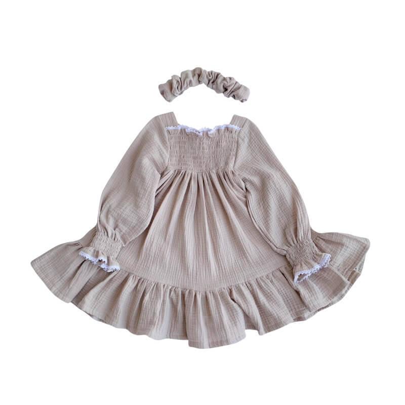 Beige muslin dress with ruffles and lace